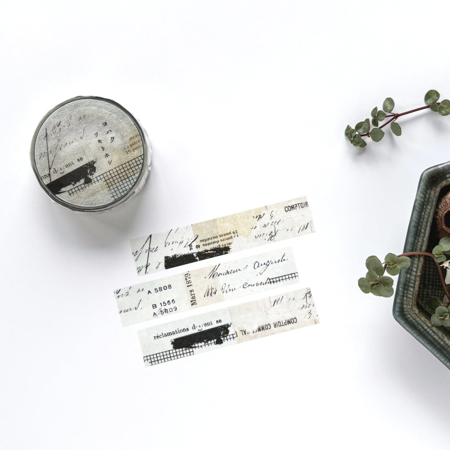 Decorative tape with vintage design, a small container with flowers on a white background