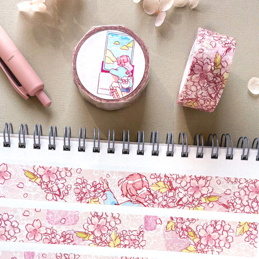 Washi tape with cherry blossom design on a notebook