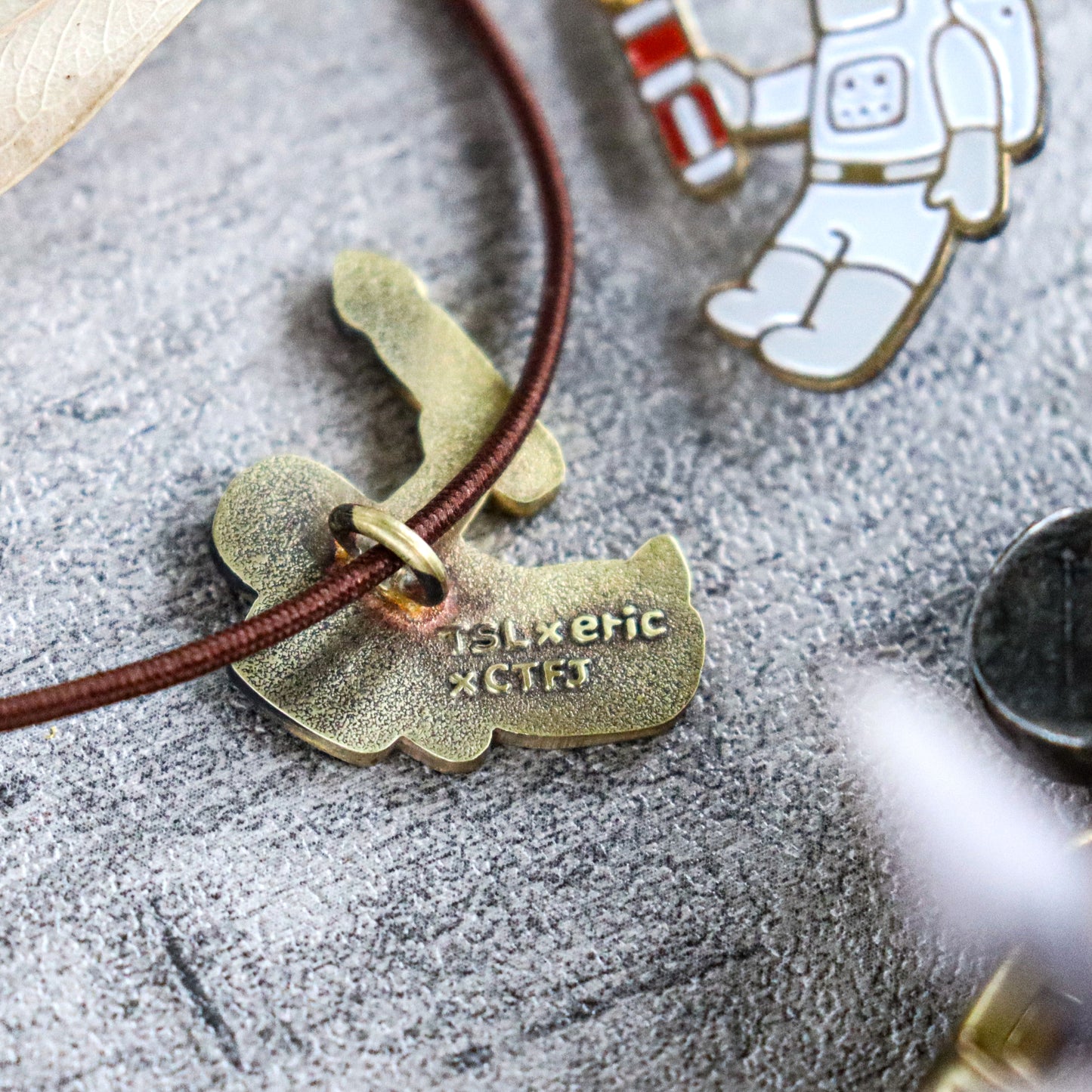 TSL x eric X CTFJ / Brass Concho Charm - Astronaut with Fountain Pen