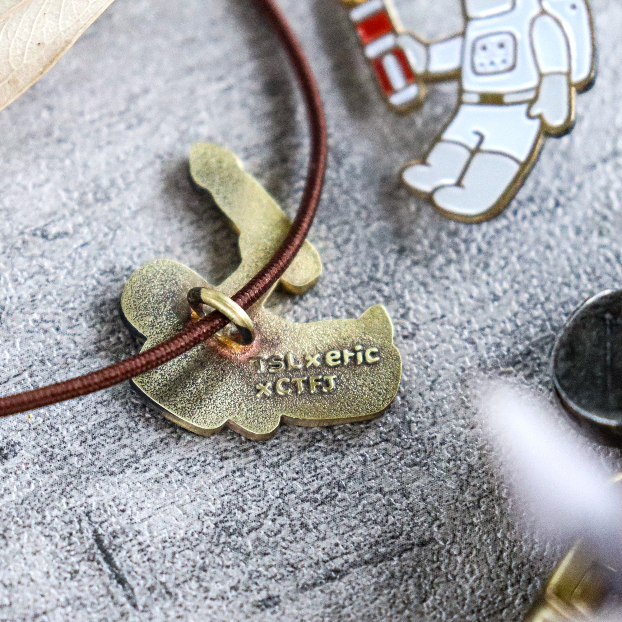 Limited Edition TSL x eric X CTFJ / Brass Concho Charm - Astronaut with Fountain Pen
