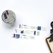 Round metal container with printed labels on a white background