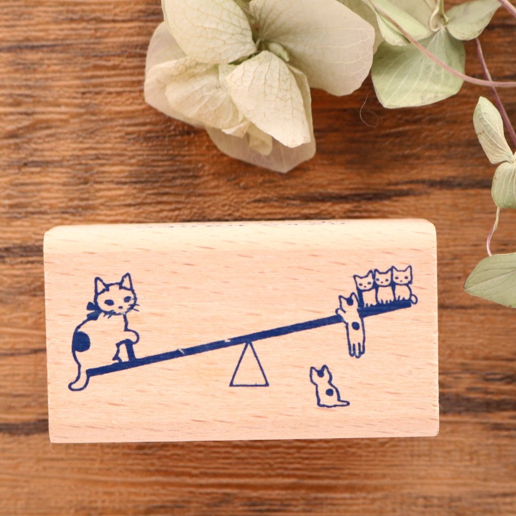 Cute Pottering Cat cats doing seesaw rubber stamp great for your letters and craft project.  Available at Cute Things from Japan.