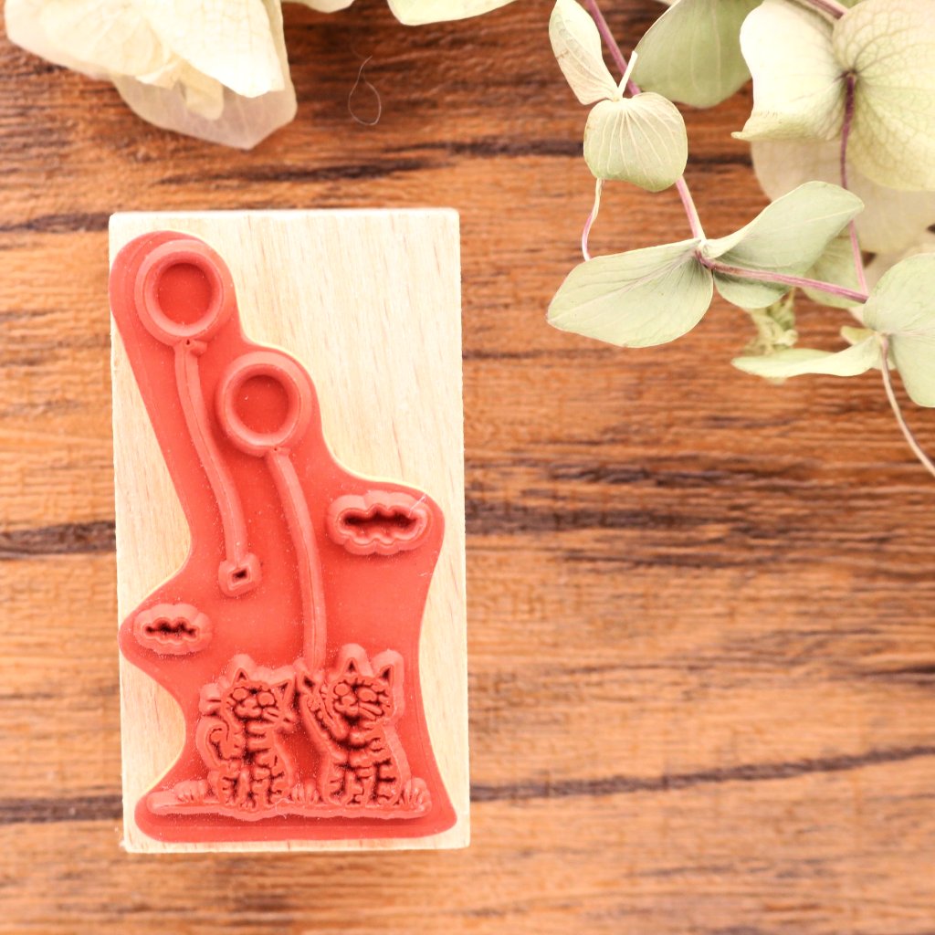 Cute cats with balloons rubber stamp great for your letters, traveler's notebook, planner, journal and lots more.  Available at Cute Things from Japan.