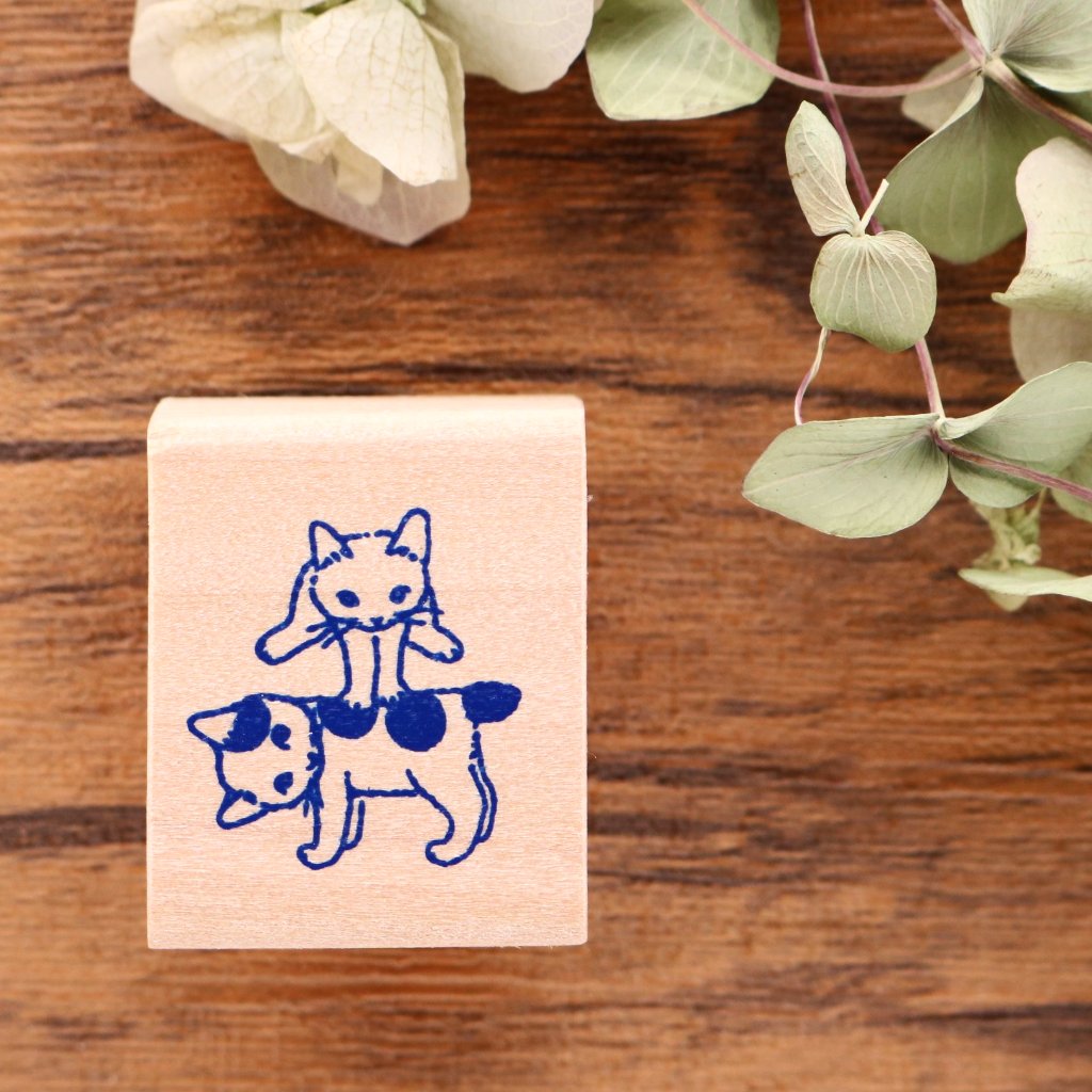 Cute Pottering Cat playing leapfrog rubber stamp great for your letters and craft project.  Available at Cute Things from Japan.