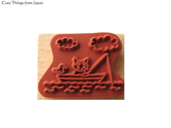 Cute Pottering Cat fishing rubber stamp for your traveler's notebook, hobonichi, planner and journal.  Available at Cute Things from Japan.