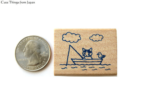 Cute Pottering Cat fishing rubber stamp for your traveler's notebook, hobonichi, planner and journal.  Available at Cute Things from Japan.